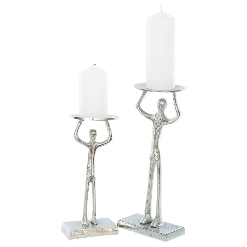 Man lifting pillar sculpture